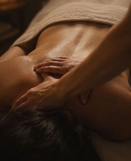 Firm deep tissue Thai massage on the shoulders and back at Enyo Thai Massage Athens